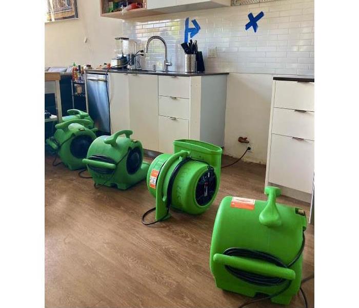 Drying equipment in kitchen.