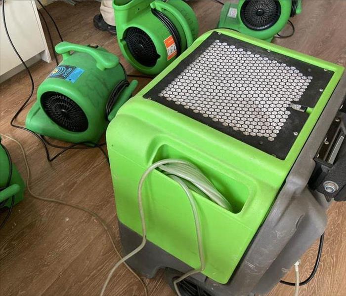 Drying equipment on floor.