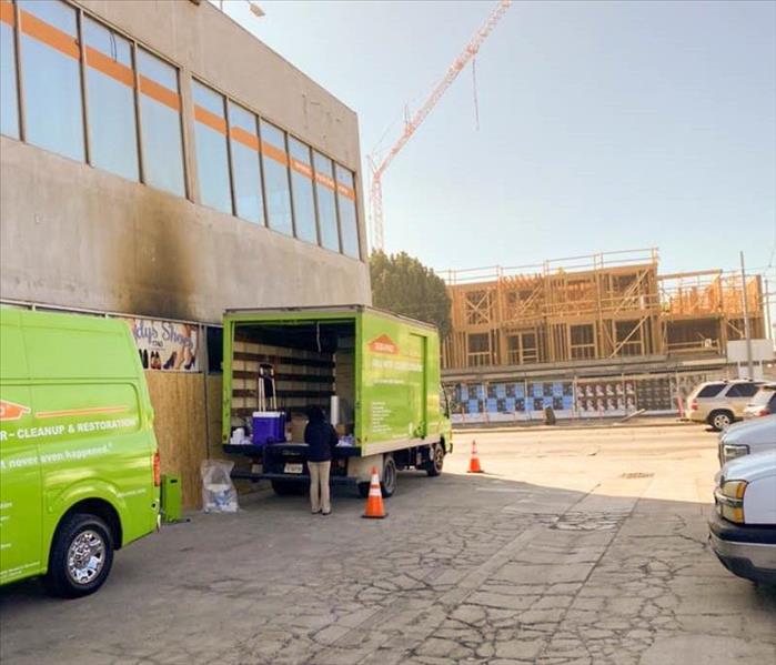 Unloading the SERVPRO truck in front of commercial business